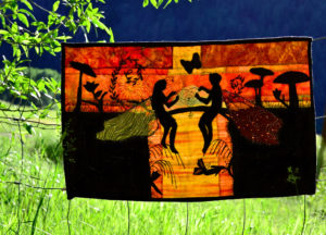 A fairy girl and boy sit weaving a spiderweb heart at sunset in one of our best ever landscape quilt designs