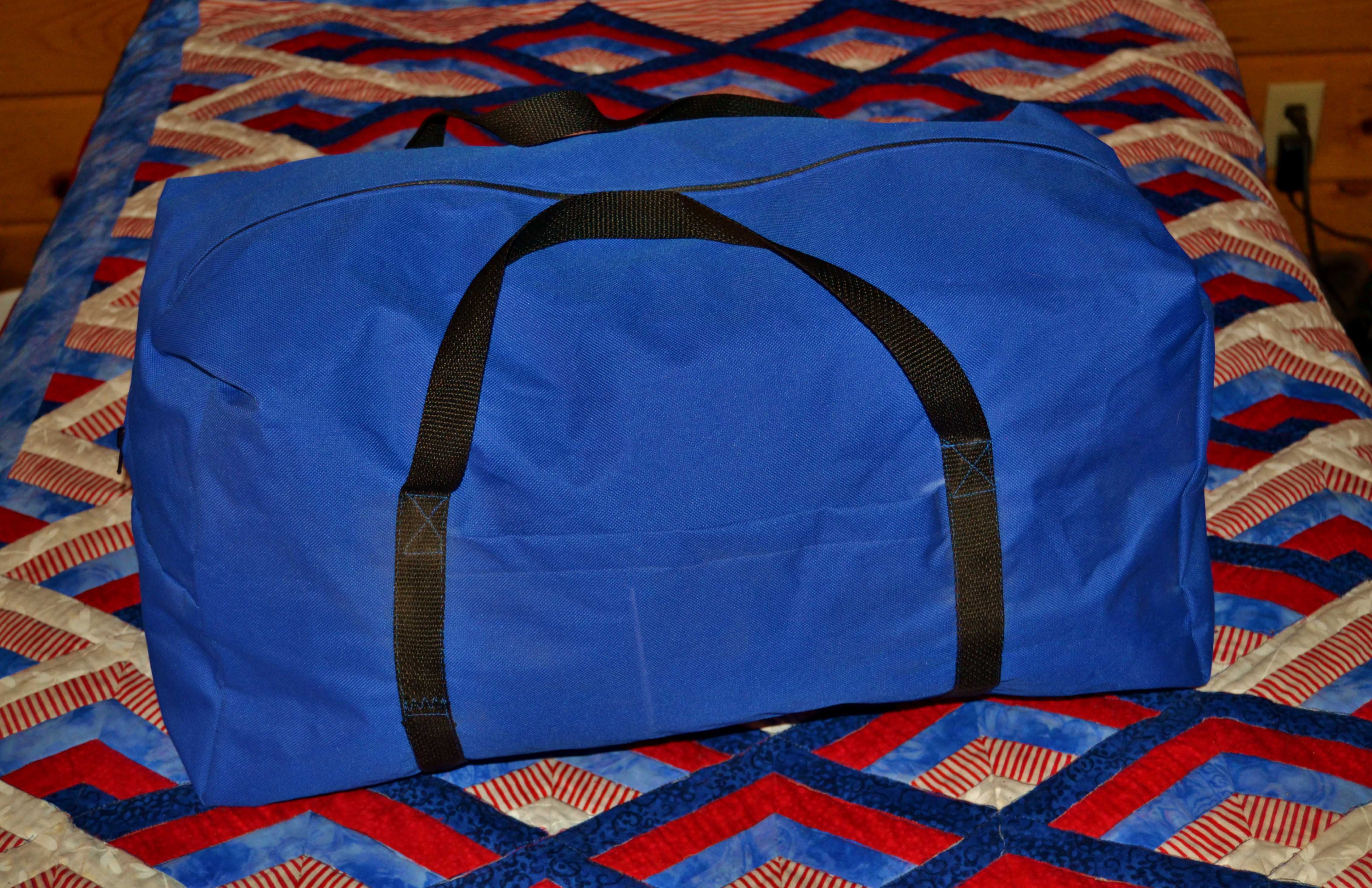 Shows a blue and black custom duffle bag