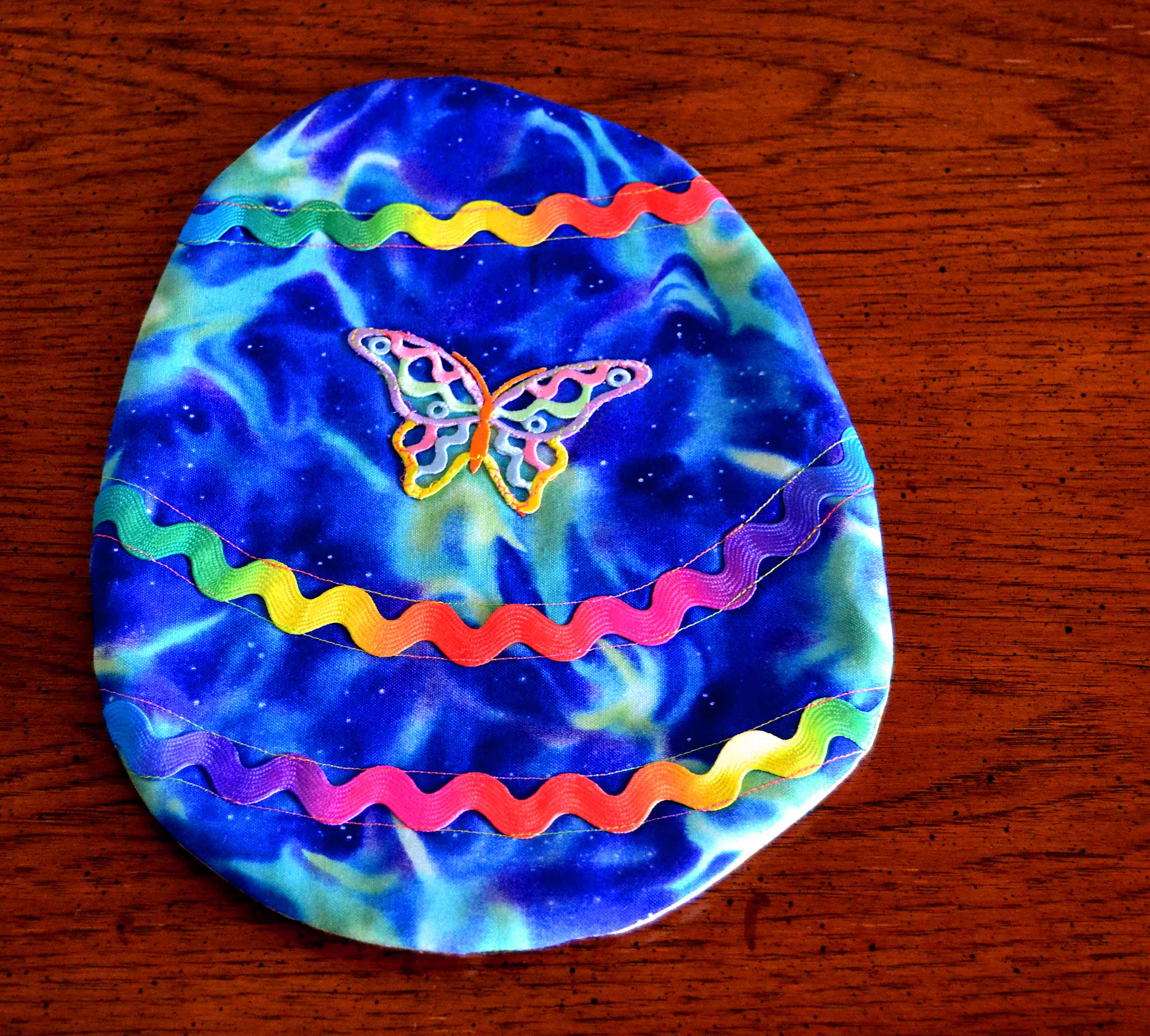 Bright baby easter egg shaped potholder