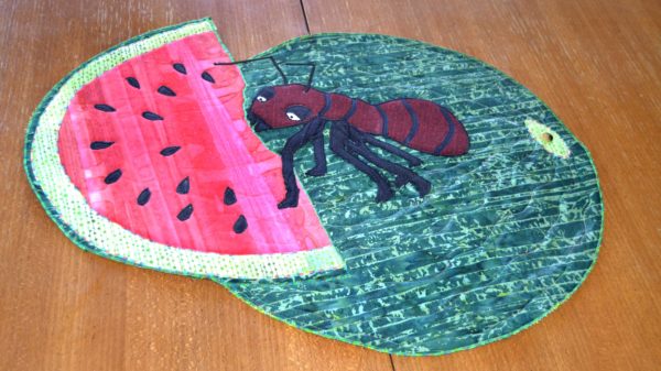 ant on a watermelon summer picnic crasher