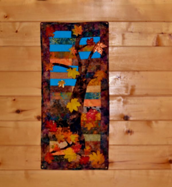 under the spreading maple tree autumn maple tree quilted wall hanging